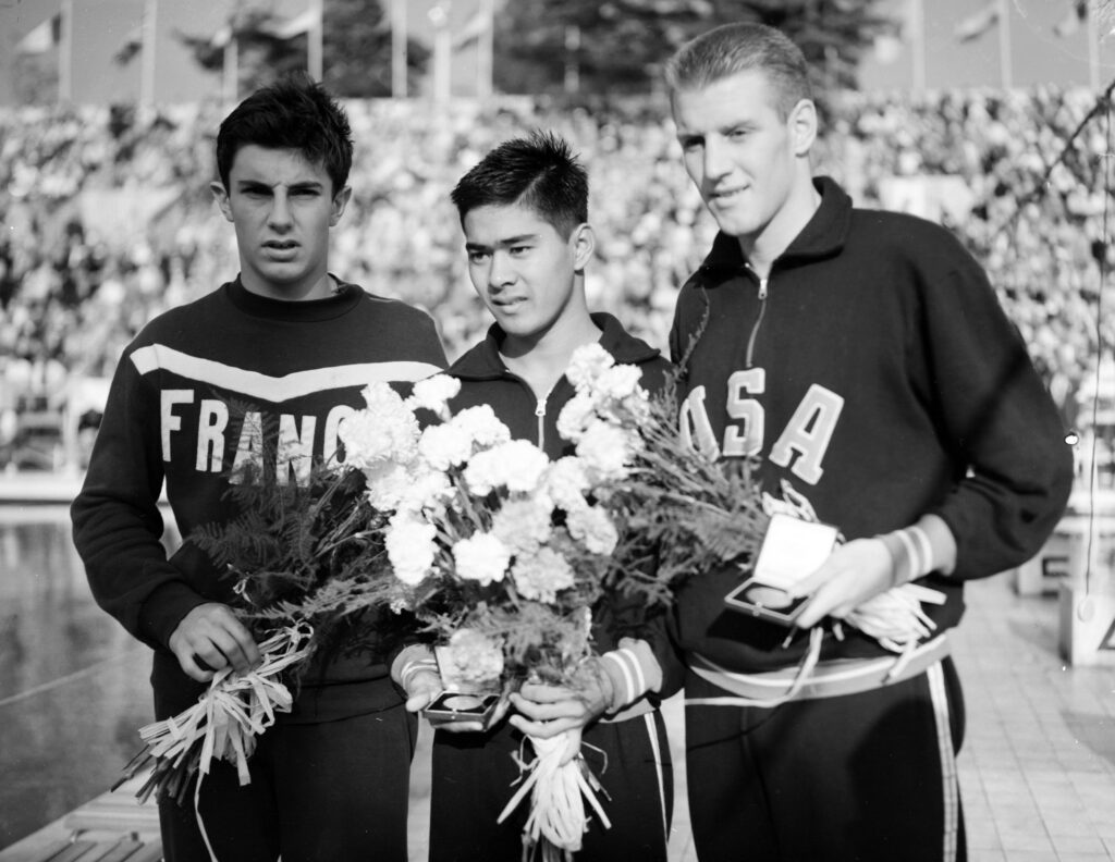 Gilbert Bozon, Yoshinobu Oyakawa and Jack Taylor at the Summer Olympics